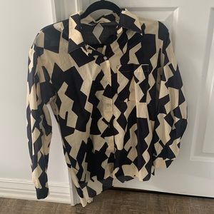 Unique Zara button up shirt. Lightly worn.